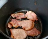 A picture of step 2 of My Smokey Bacon, Black Pudding & fried Egg Toasted Sandwich 🥰.