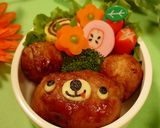 A picture of step 8 of Meat Wrapped Onigiri Rice Balls using Shabu-Shabu Pork Slices.