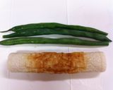 A picture of step 2 of For Bentos: Chikuwa Fish Stick Tamagoyaki.