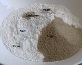 A picture of step 1 of Cardamon Mandazi.