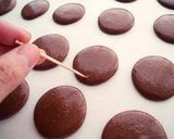 A picture of step 24 of Rich Bitter Chocolate Macarons.