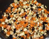 A picture of step 4 of Dry Curry with Eggplant and Tomato.