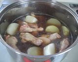 A picture of step 4 of Stewed Daikon and Chicken Drums (in Sukiyaki Sauce).