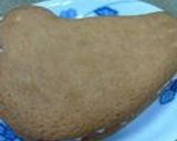 A picture of step 10 of Rum Raisin Ice Cream Cookie Sandwiches.