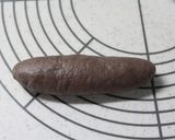 A picture of step 7 of Chocolate Filled Black Cocoa Cornets and Rolls.