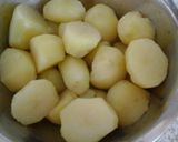 A picture of step 1 of My New Potatoes in Garlic Parsley Butter with Pea Pods 😙.