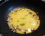 A picture of step 6 of Fluffy Scrambled Eggs with Shiitake Mushrooms.