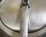 A picture of step 2 of Gajar Ka Halwa (Pressure Cooker Method).