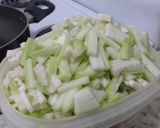 A picture of step 2 of Lau Chingri/লাউ চিংড়ি.