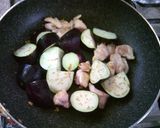 A picture of step 6 of Eggplant & Chicken Tomato Curry.