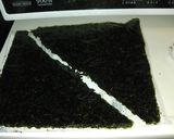 A picture of step 3 of Bonito Flake Rice Ball Bento.