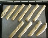 A picture of step 8 of Chocolate Banana Stick Bread Rolls.