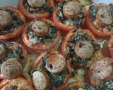 A picture of step 6 of Roast tomatoes with olives, capers, cheese and sausage.