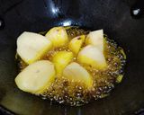 A picture of step 1 of Bengali style Chicken aloo jhol.