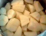 A picture of step 3 of Volcano Potatoes... Bacon & Cheddar.