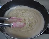 A picture of step 5 of Tarako Spaghetti with Fluffy and Creamy Sauce.