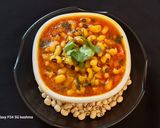 A picture of step 6 of Punjabi style Lobia Masala.