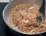 Foto del paso 7 de la receta: Arroz meloso con jamón ibérico, Idiazábal y alcachofa