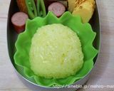 A picture of step 5 of Pokemon Character Bento - Pikachu Onigiri.