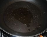 A picture of step 3 of Toasted bread omelette with herbs / cheese.