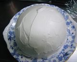 A picture of step 11 of Soccer Ball Cake.