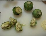 A picture of step 4 of Garlic Sautéed Baby Artichokes.