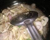 A picture of step 1 of Brinjal bharta.