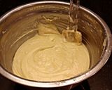 A picture of step 5 of White Butter Cake with Strawberry and Blueberry Whipped Cream.