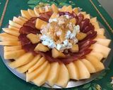 A picture of step 8 of Sunny Melon Salad with Feta, Lomo, and Sichuan Pepper.