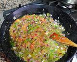 Foto del paso 13 de la receta Arroz bomba caldoso de pulpitos y tiras de piquillo