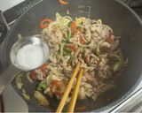 A picture of step 3 of Pork Belly and Vegetables Fry with much Peppers.