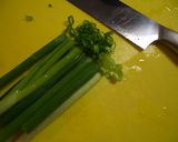 A picture of step 2 of Baby Scallops with Green Onions and a Salty, Lemon Sauce.