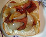 A picture of step 3 of Sausage tomato sandwich.