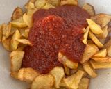Foto del paso 4 de la receta Patatas fritas con tomate frito casero y huevos