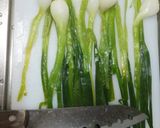 A picture of step 4 of Green Onions with Kimchi Dressing.