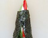 A picture of step 6 of Inside-Out Uramaki California Rolls.