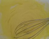 A picture of step 2 of Chocolate bisquits with cookie press machine.