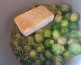 A picture of step 1 of Creamy Garlic Parmesan Brussels Sprouts (low carb).