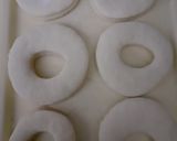 A picture of step 4 of Mini coconut doughnuts.