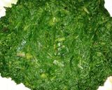 A picture of step 3 of Alu Palak.