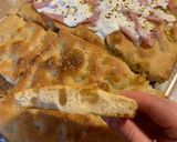 Foto del passaggio 8 della ricetta Focaccia a lunga lievitazione con pasta madre