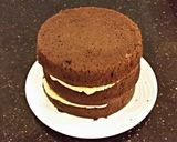 A picture of step 12 of Chocolate Pumpkin Layer Cake.