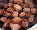 A picture of step 3 of Chestnuts Simmered in Japanese Sake.