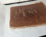 A picture of step 6 of Snickers Chocolate Roll Cake.