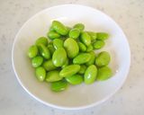 A picture of step 1 of Crispy Skewered Pork Wraps with Edamame and Cheese.