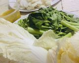 A picture of step 1 of Salmon & Kang Kong in Tamarind Broth : Filipino Fish Sinigang > Savoury Sour Soup vs Tom Yum.
