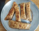 A picture of step 6 of Roti Roll.