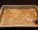 A picture of step 7 of Toasted Coconut Caramel Cashew Bars.