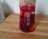 A picture of step 1 of Strawberry Raspberry Cherry Banana Smoothie.