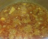 A picture of step 7 of Anday choly ka salan.